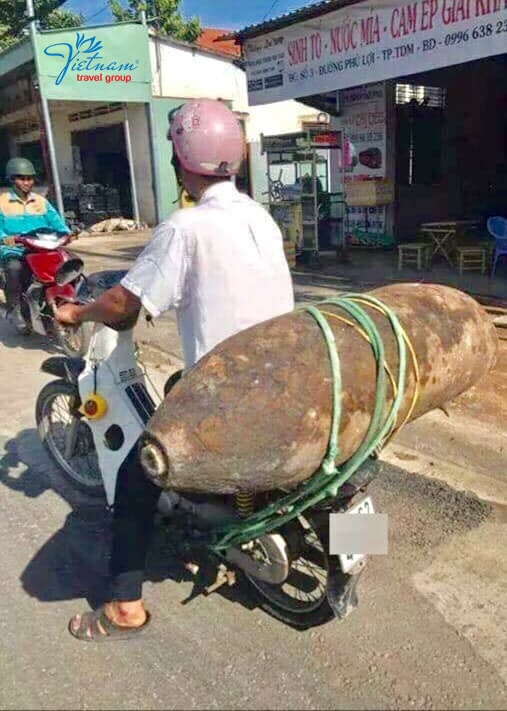 man-carry-bomb-with-his-motorbike-vietnam-travel-group